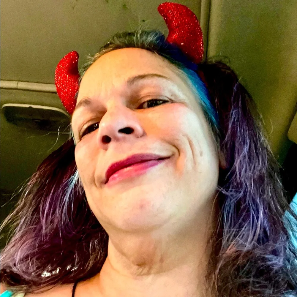 It’s a Red Devil Headband. The whole thing is covered with red sparkly glitter.